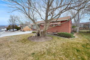 View of front of house featuring brick siding