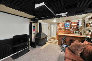 Office area with light carpet and a sink