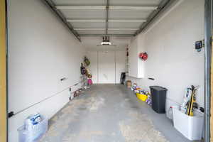 View of attached garage with extra storage