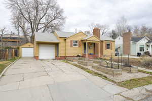 Home with attached garage and secondary garage in the back