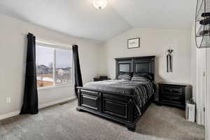 Spacious primary suite - vaulted ceilings,  ensuite bathroom, double vanity, tile flooring, full tile shower, separate soaking tub, and a large walk-in closet