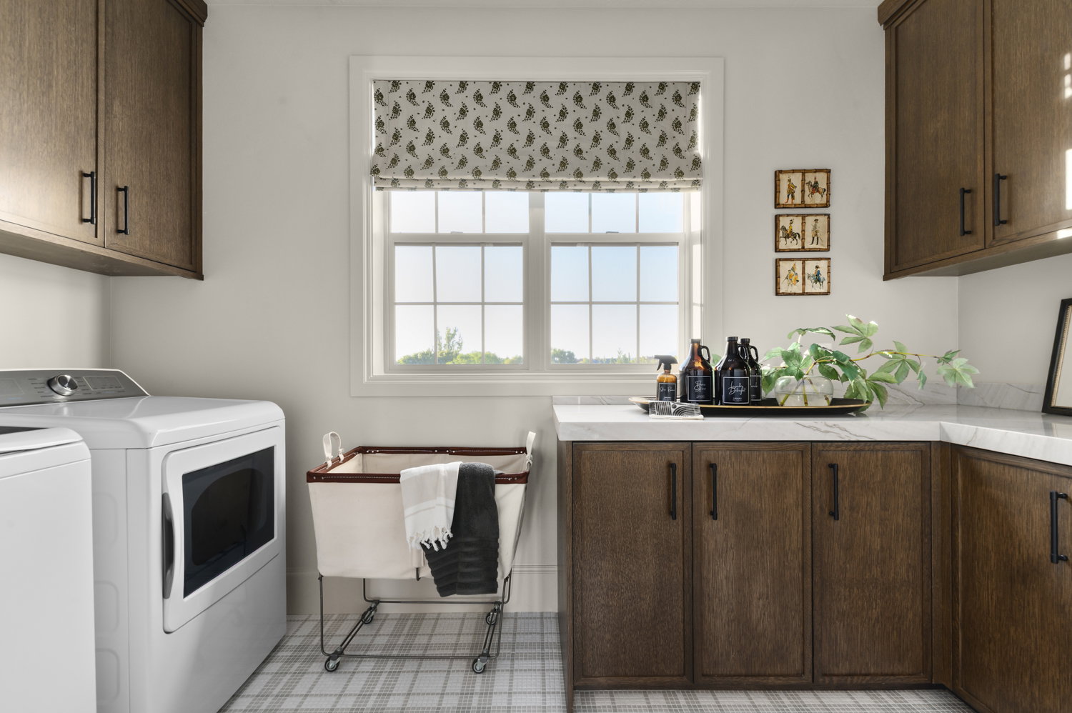 Laundry room featuring cabinet space and washing machine and clothes dryer