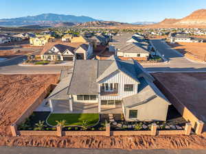 Aerial view of residential area with a mountain backdrop