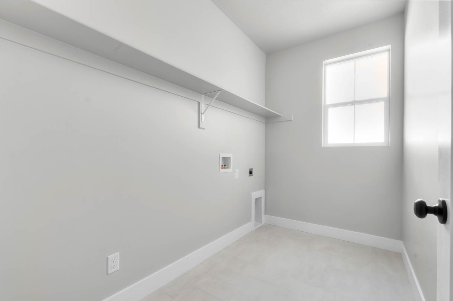 Laundry room featuring hookup for a washing machine and hookup for an electric dryer