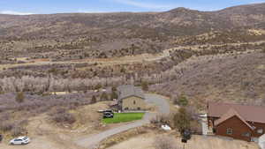 View of property location featuring a mountain backdrop and rural landscape