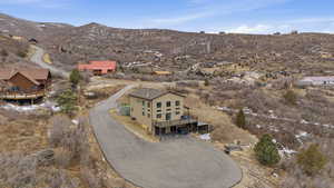 Aerial view of residential area with a mountainous background