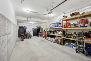 Garage featuring a garage door opener