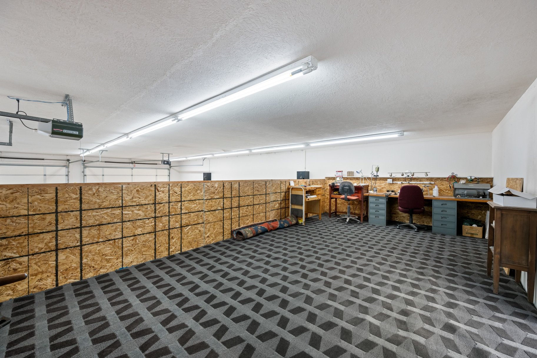 Garage featuring an office area