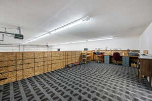 Garage featuring an office area