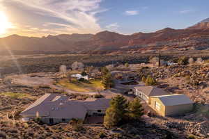 View of mountain backdrop featuring a desert landscape