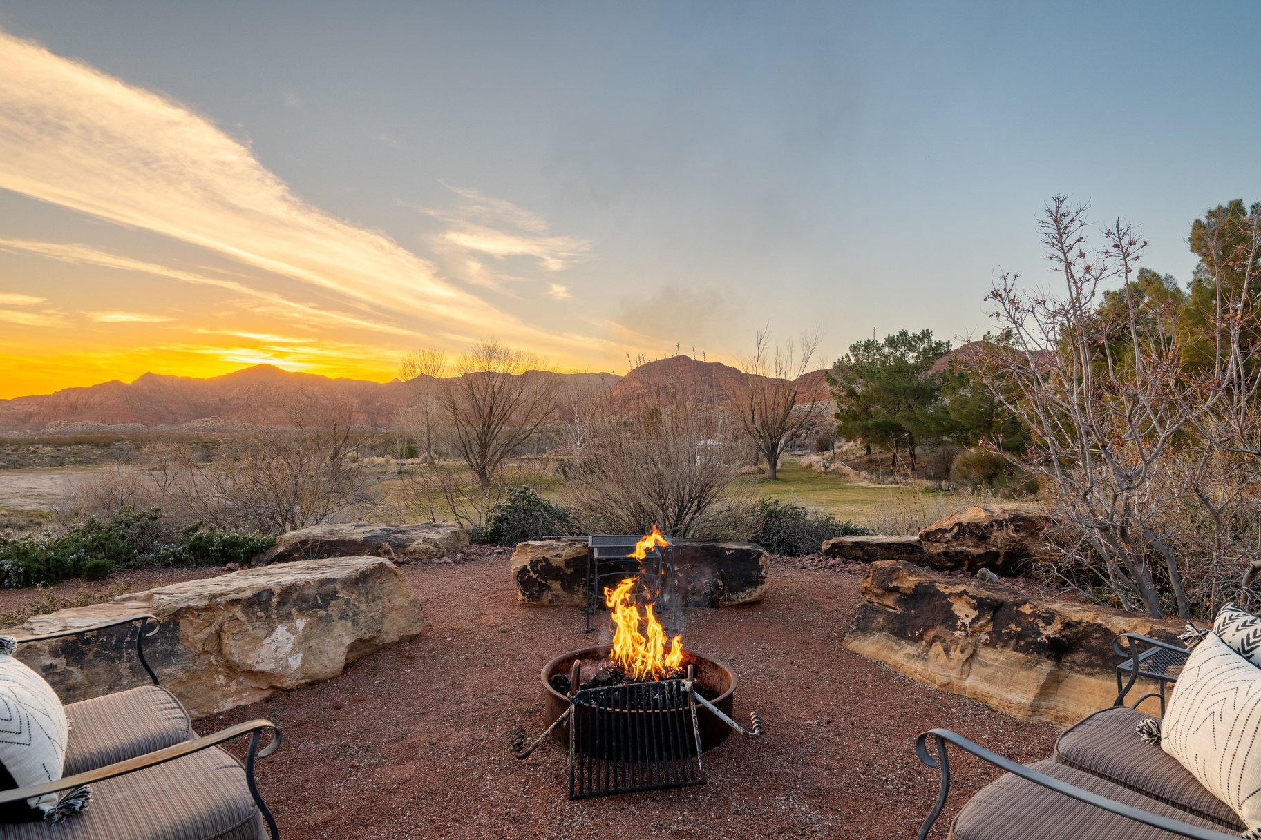 View of patio / terrace with an outdoor fire pit and a mountain view