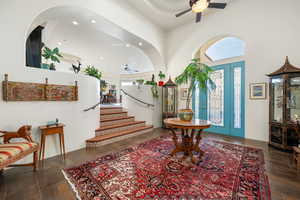 Foyer entrance featuring wood finish floors, ceiling fan, and recessed lighting