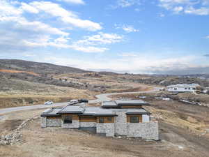 Exterior space with a mountain backdrop