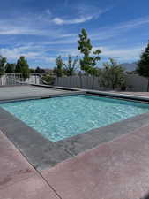 View of pool featuring a fenced backyard