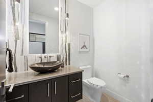 Bathroom with vanity and toilet