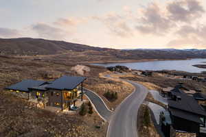Aerial view at dusk of a water and mountain view