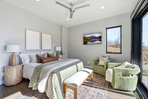 Bedroom featuring a ceiling fan, recessed lighting, and wood finished floors