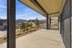 View of patio / terrace with a mountain view