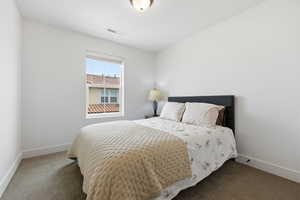 Bedroom with carpet flooring