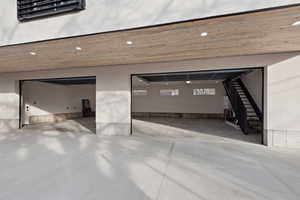 Garage featuring recessed lighting and a heating unit