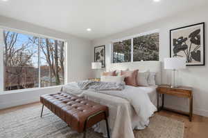 Bedroom featuring light wood finished floors and recessed lighting