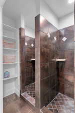 The upstairs family room was used as a bunk room at one point, so it has 4 showers and double vanity.