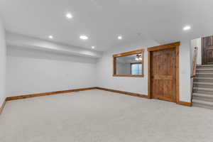 Basement Family room has a window to the exercise room
