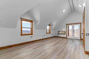 The workshop is accessed from lower garage or it has it's own exterior entrance