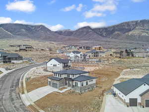 Aerial perspective of suburban area featuring mountains