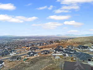 Aerial view of residential area with a mountainous background