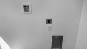 Laundry area featuring hookup for an electric dryer and washer hookup