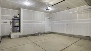 Garage with secured water heater and a garage door opener