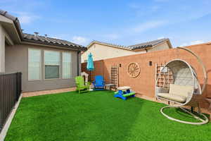 View of fenced backyard