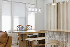 Dining area featuring light wood-style flooring