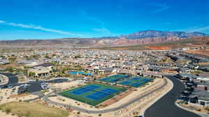 Aerial view of residential area featuring a mountainous background