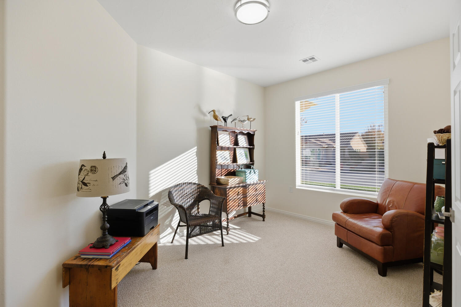 Living area with carpet and baseboards