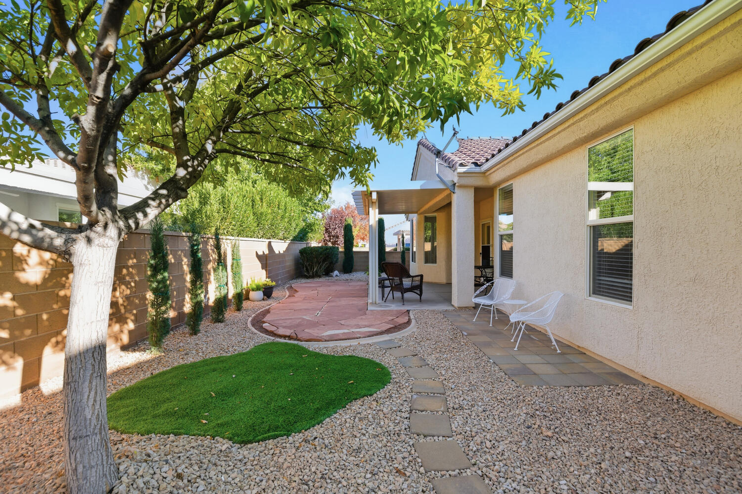Fenced backyard featuring a patio area