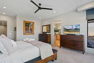 Bedroom with a ceiling fan, light colored carpet, and recessed lighting