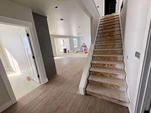 Staircase with wood finished floors
