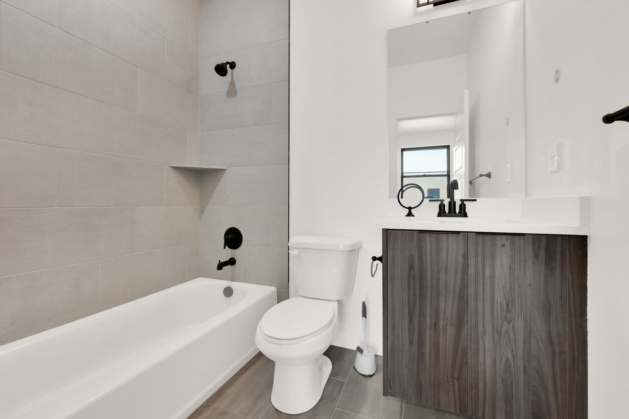 Bathroom with vanity and shower / bathtub combination