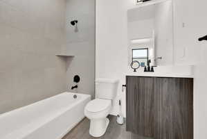 Bathroom with vanity and shower / bathtub combination