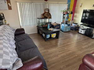 Living area with wood finished floors