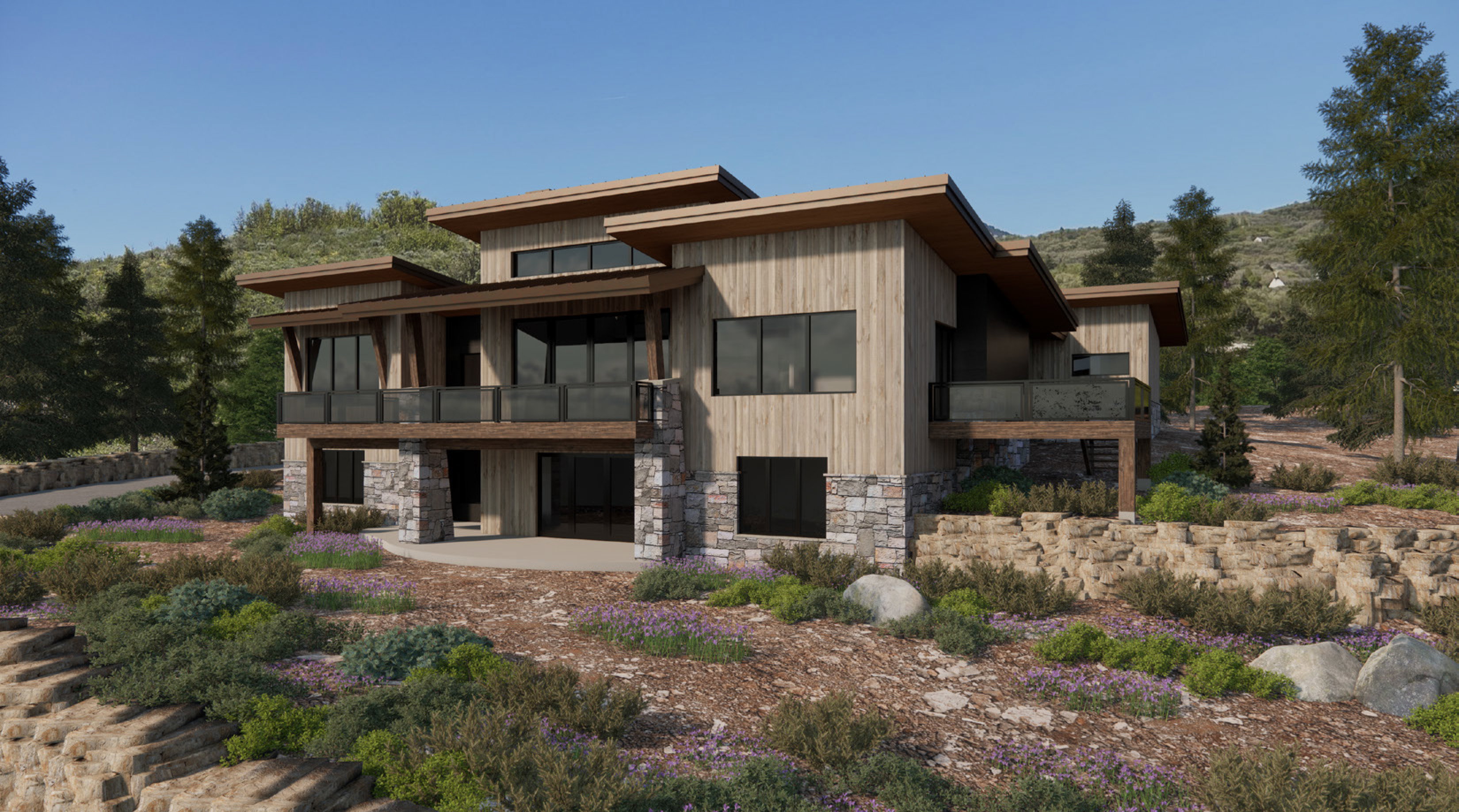 Rear view of house with stone siding, a patio area, and a sunroom