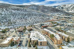 Snowy aerial view with a mountain view