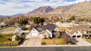 Aerial view of residential area with a mountainous background