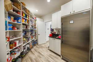 Storage area featuring a sink