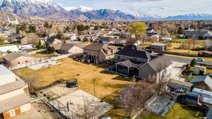 Aerial view of residential area featuring mountains