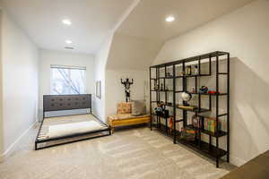 Living area featuring carpet flooring and recessed lighting