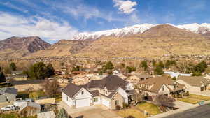 View of mountain backdrop with nearby suburban area