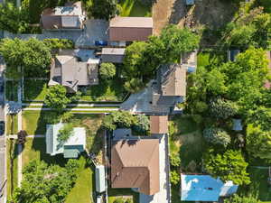 Aerial overview of property's location with nearby suburban area